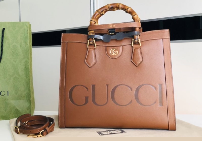 G*u*i top handle bags